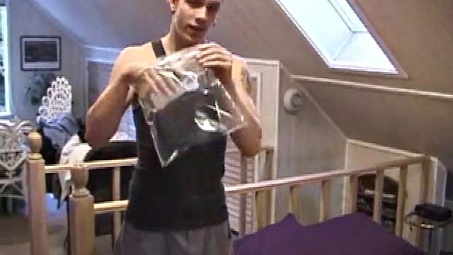 Shane plays with himself until his cock is nice and hard. He pulls down his shorts and briefs to reveal his excited cock.