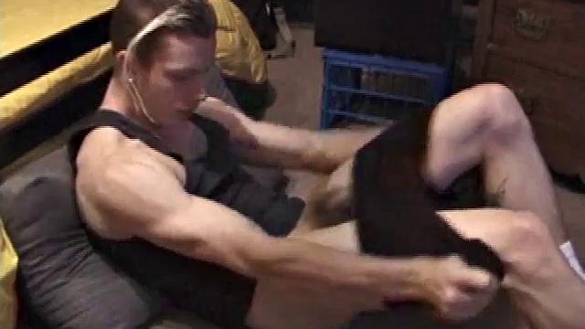 Shane plays with himself until his cock is nice and hard. He pulls down his shorts and briefs to reveal his excited cock.