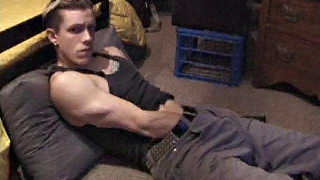 Shane plays with himself until his cock is nice and hard. He pulls down his shorts and briefs to reveal his excited cock.