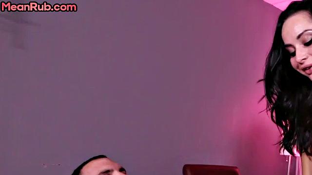 Femdom stunning MILF masseuse wanks client's oiled cock