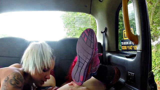 Insatiable hitchhiker gets her tight pussy fingered in a taxi