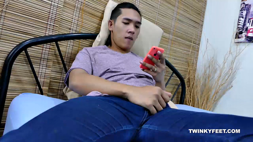 When Freddy is alone and horny, he likes to get barefoot and play with his Asian boy feet. He goes into his room and starts watching a male feet video on his smart phone.