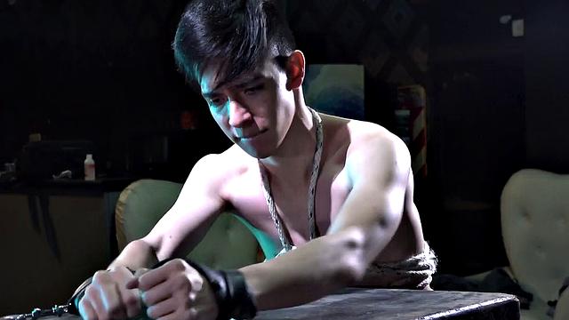 Things get kinky in the bondage and spanking scene as skinny little Antu finds himself naked and shackled, while Fabrice has his way with him.