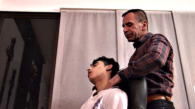 Young Latino Arthur is at his computer when daddy approaches him from behind and quickly makes it clear he wants to play