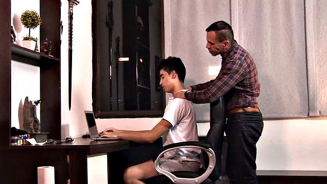 Young Latino Arthur is at his computer when daddy approaches him from behind and quickly makes it clear he wants to play