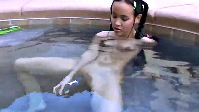 Tiny Tabby Fingering at pool