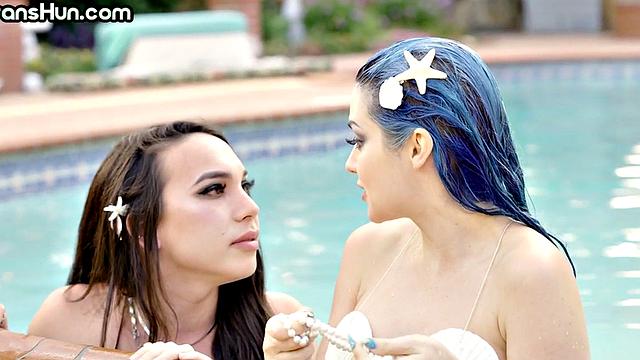 TS mermaid fucks babe's pussy outdoors in swimming pool