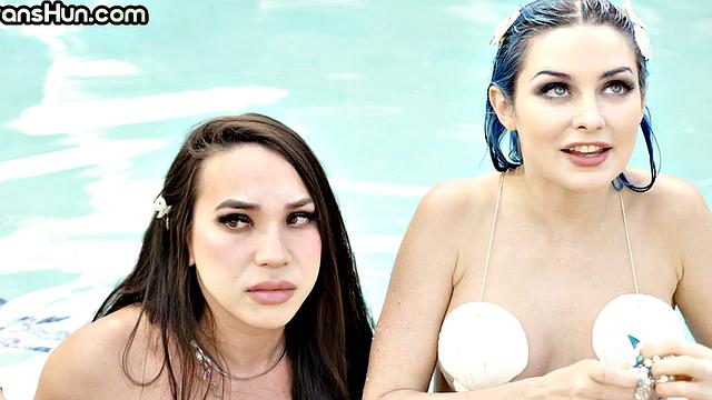 TS mermaid fucks babe's pussy outdoors in swimming pool