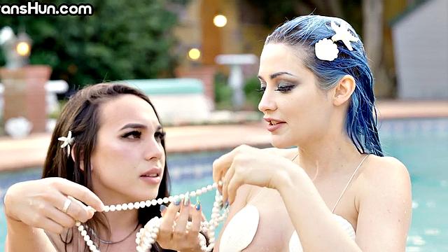 TS mermaid fucks babe's pussy outdoors in swimming pool