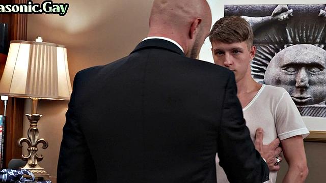 Suited gay mason with athletic body fucks twink