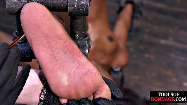 Skinny ebony spanked in dungeon