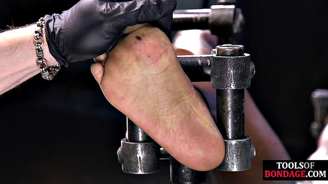 Skinny ebony spanked in dungeon