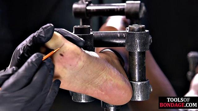 Skinny ebony spanked in dungeon