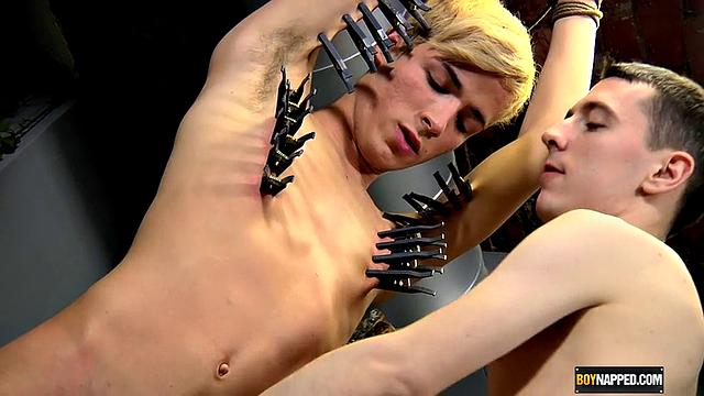 Oli Jay bends over for Reece Stewart's strap-on in a wild gay pegging session