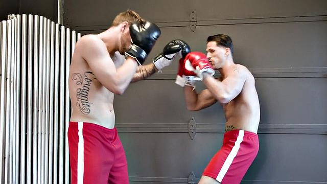 Boxing handsome stud fucks boyfriend's asshole on bed after kissing