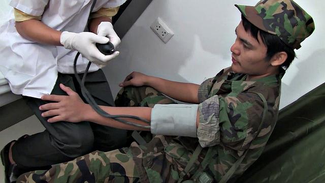 Skinny Asian soldier teased and barebacked by medic