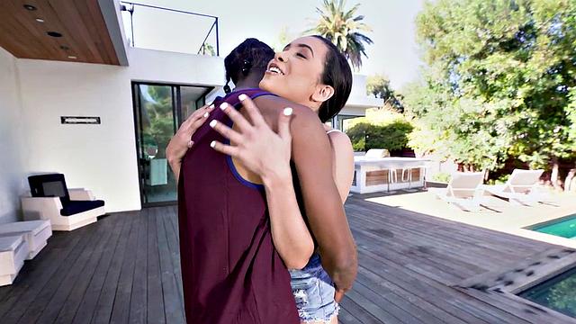 Watch this tattooed brunette get her trimmed pussy drilled by a huge black cock in the living room