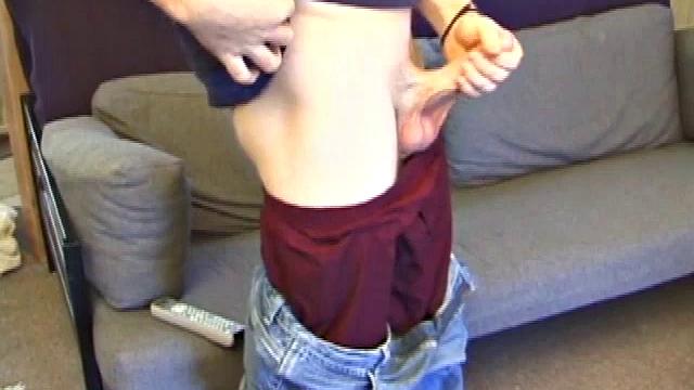 With a porn video playing, Cory pulls down his pants and lubes up his cock. He strokes with determination, edging himself before shooting a huge nut on his stomach.