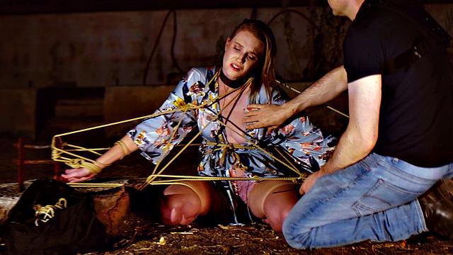 Blond babe gets nipples hurt while drinks piss