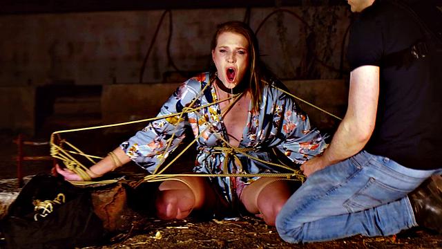 Blond babe gets nipples hurt while drinks piss