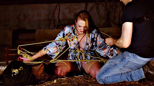 Blond babe gets nipples hurt while drinks piss