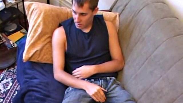 While watching a porn video, British punk Kiefer Foxx works up a sizeable boner and proceeds to wank away. Soon an off-camera hand begins working his butt with an anal probe and then strokes Kiefer's cock, until he blasts a cum load.