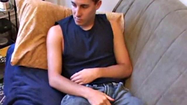 While watching a porn video, British punk Kiefer Foxx works up a sizeable boner and proceeds to wank away. Soon an off-camera hand begins working his butt with an anal probe and then strokes Kiefer's cock, until he blasts a cum load.