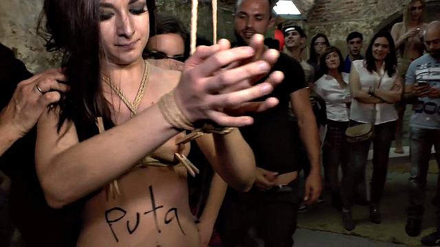 Public BDSM slut spanked and fucked for audience