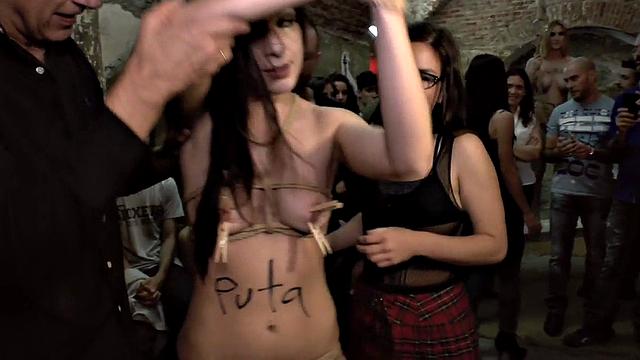 Public BDSM slut spanked and fucked for audience