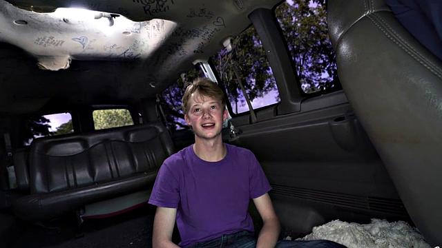 Brown-haired teen with big tits deepthroats and gives handjob to driver in car