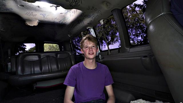 Brown-haired teen with big tits deepthroats and gives handjob to driver in car