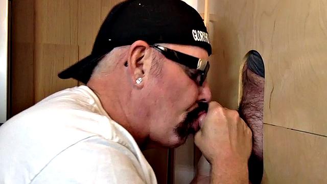 Gray mature amateur giving head to gloryhole cock