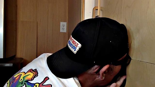 Gray mature amateur giving head to gloryhole cock