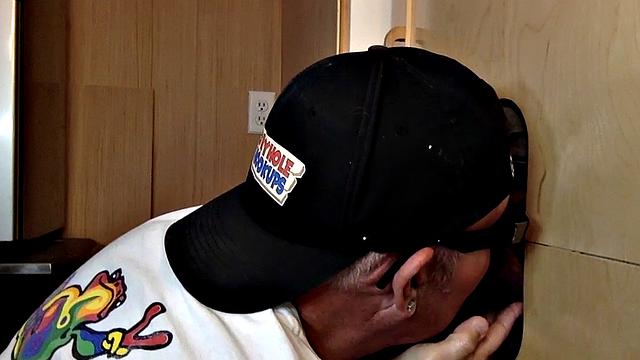 Gray mature amateur giving head to gloryhole cock