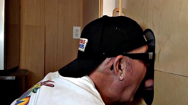 Gray mature amateur giving head to gloryhole cock