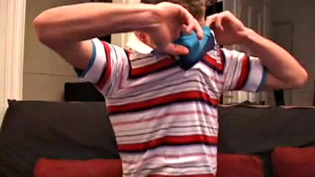 Brayden Stone strokes his cock and cums solo on camera