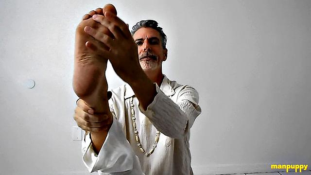 Richard Lennox Practices Foot Worship During Yoga