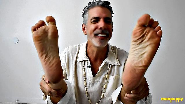 Richard Lennox Practices Foot Worship During Yoga