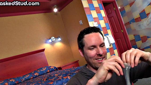 Masked and muscled solo jerks cock till cum in condom