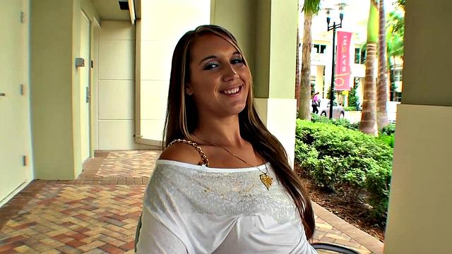 A tattooed babe smile as she gets her ass drilled in reverse cowgirl POV