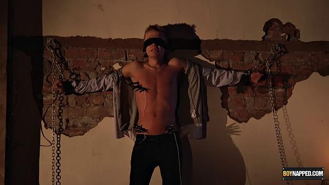 Chris Jansen submits to rough gay bondage to pay off his debt