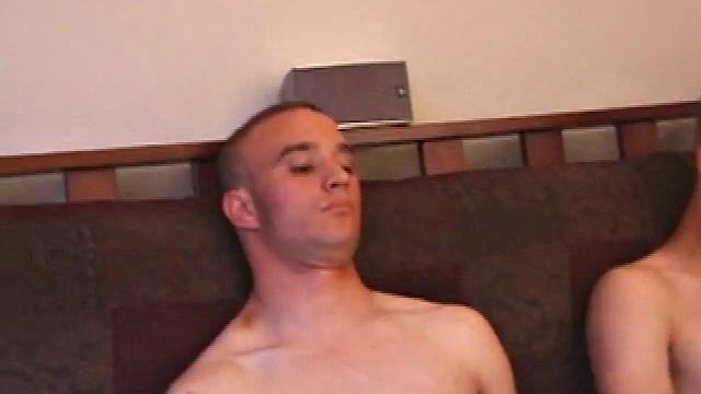 Ethan strokes side by side with Aaron, hands working cocks slow and steady until they both explode