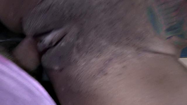 Curly-haired ebony babe gives head and rides taxi hard