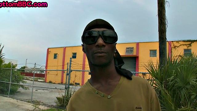 Nubian thug rides cock outdoors next to college bus