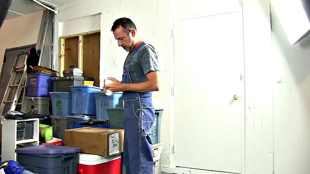 When a sex toy falls out of a box Victor decides to try it on his big dick. He quickly gets naked, slides his cock in deep and thrusts it up and down on his hard cock.