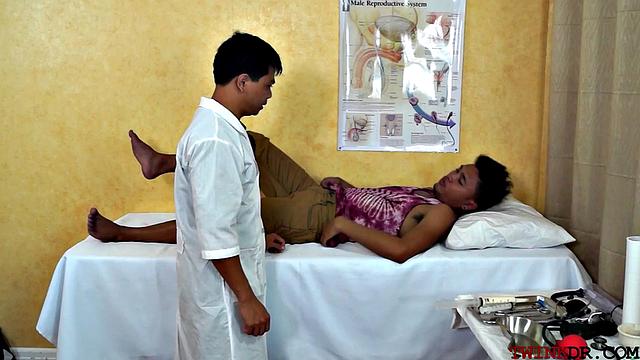 Asian hunk receives blowjob from his gay doctor