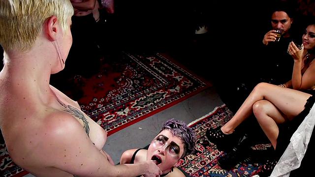 BDSM submissive lez licks lezdom feet in public for voyeurs