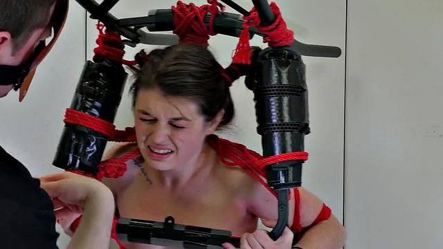 Restrained bondage babe gets ass fucked