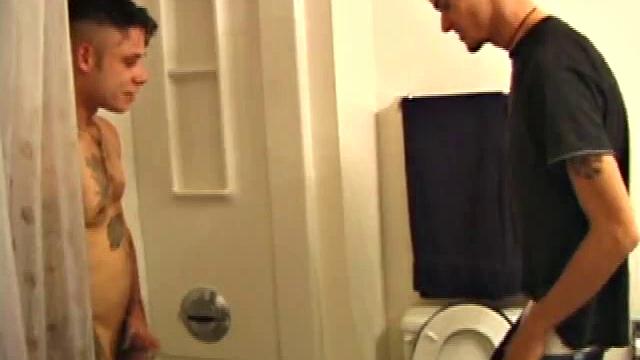 Derrick comes into the bathroom to take a piss, while Dillon is in the shower. When offered a blowjob, he strips, jumps up on the sink counter and leans back as Dillon sucks him clean.