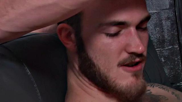 Tattooed stud fucks muscled bottom after cocksucking